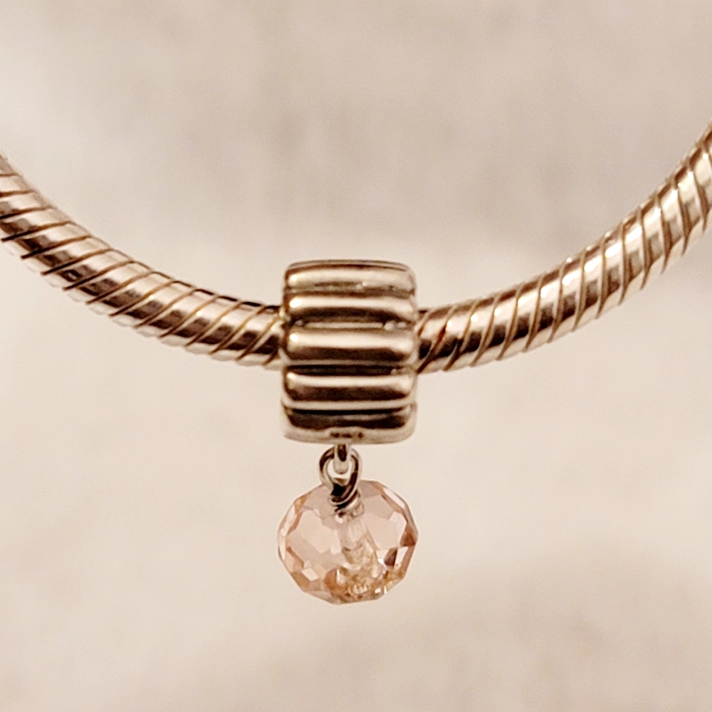 925 Sterling Silver Dangle Charm w/pink gem. Fits Pandora Bracelets
